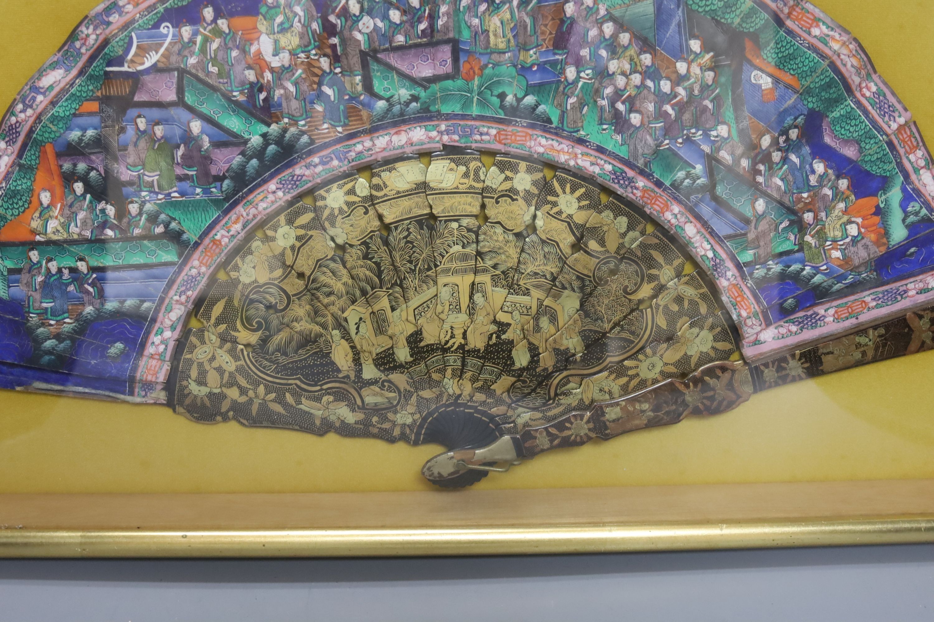 A cased 19th century Chinese Canton export gilt decorated lacquer fan, with painted paper leaf, case 35 x 59 cm